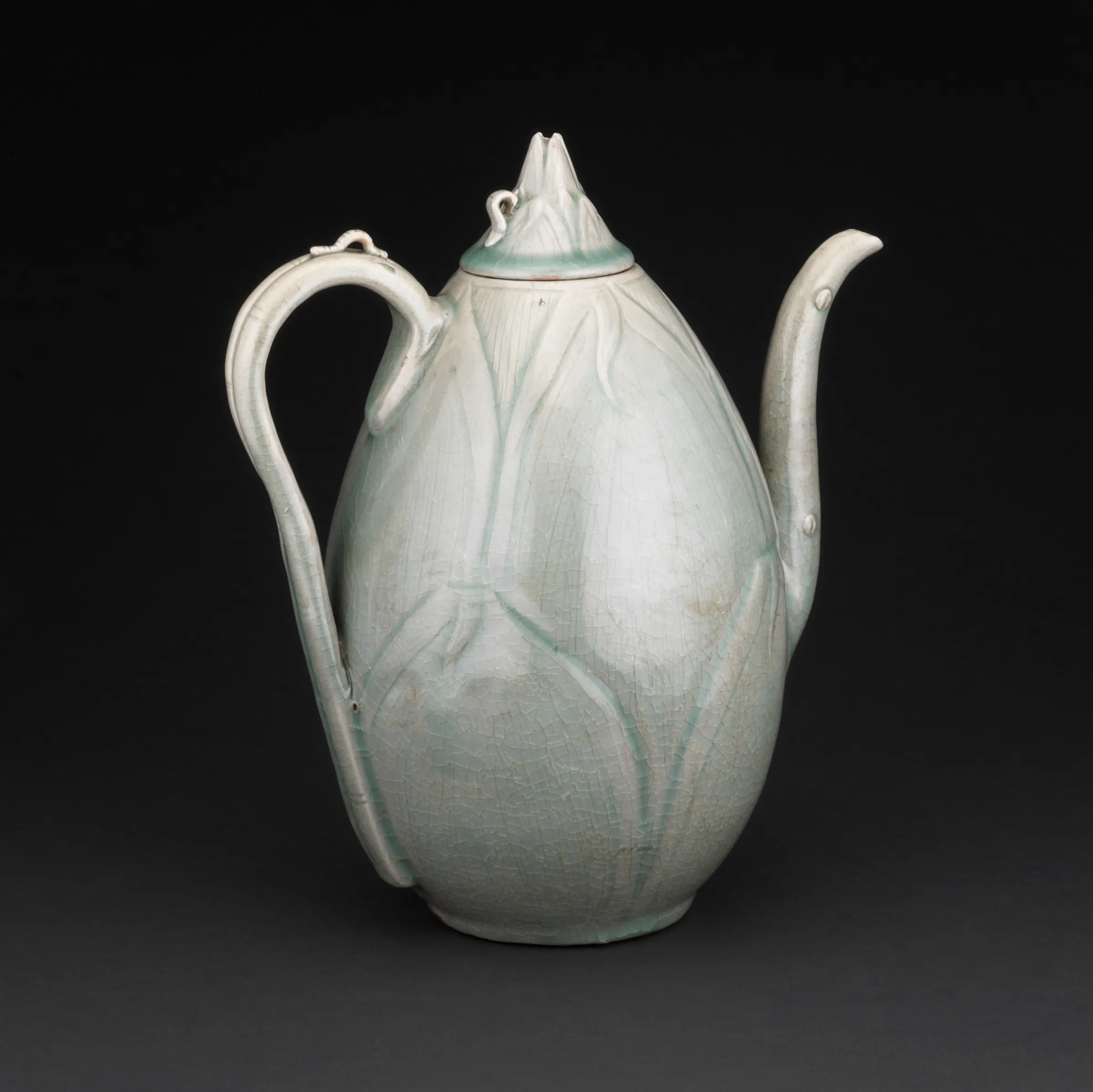 Korean celadon ewer shaped like a bamboo shoot, 12th century, on a dark ground