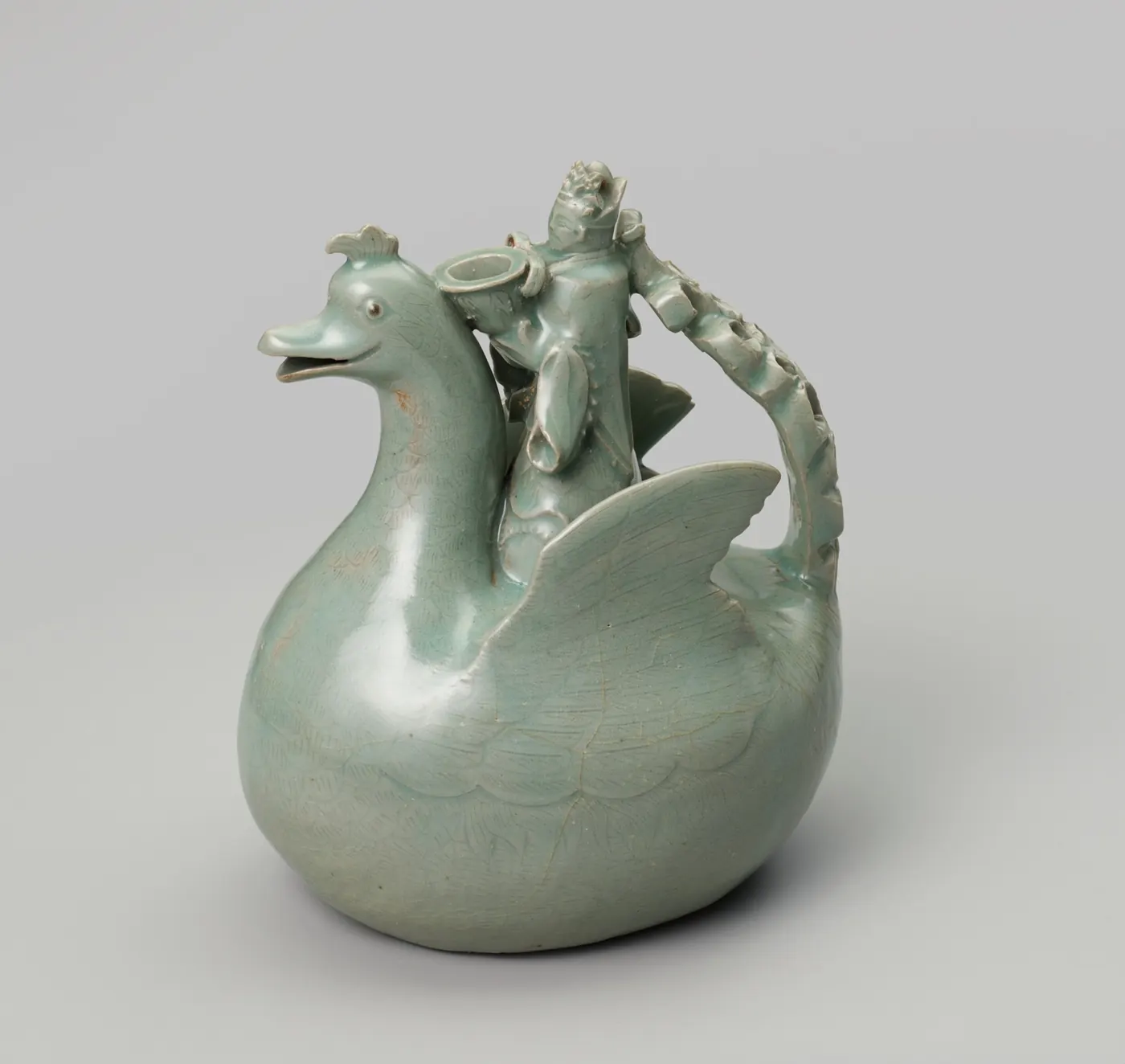 Korean celadon ewer shaped like a duck carrying a Daoist priest, 12th century