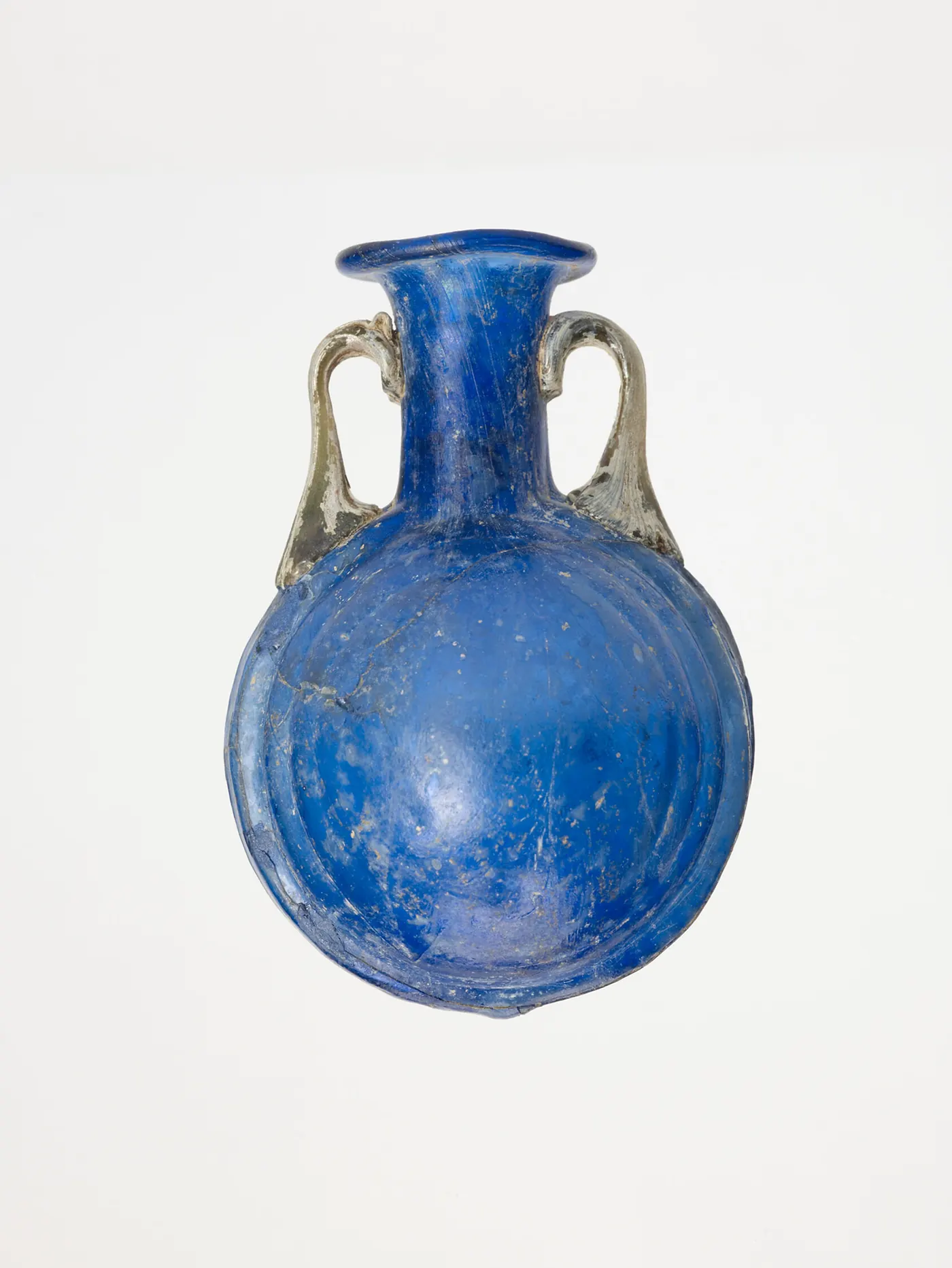 Roman two-handled bottle of mould-blown cobalt blue glass, 1st century